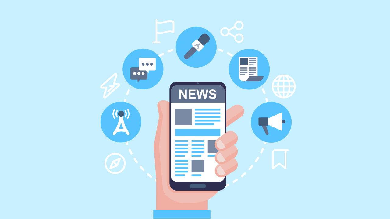 A hand is holding a mobile phone. The word ‘News’ is written in large letters on the screen, accompanied by images and text. Various icons are displayed around the screen, including a microphone, speech bubbles, a newspaper and a megaphone.