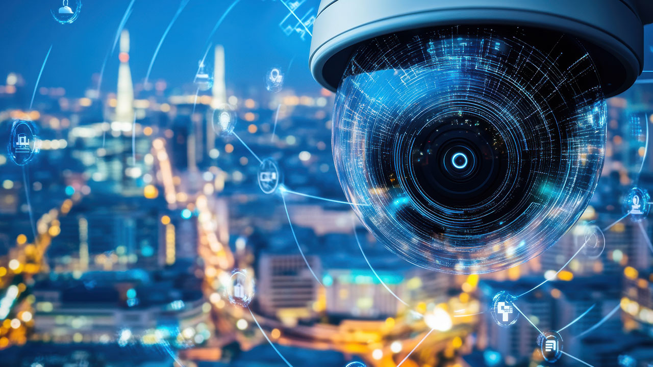 A 360-degree camera eye in front of a blurred, illuminated city in the background